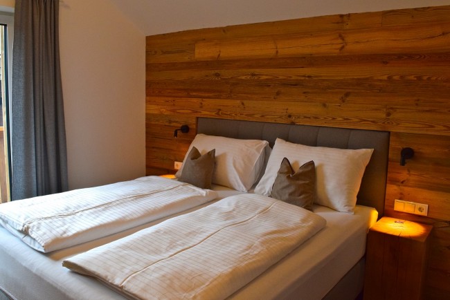 Schlafzimmer im Alpine Style im Appartement Mountain Room