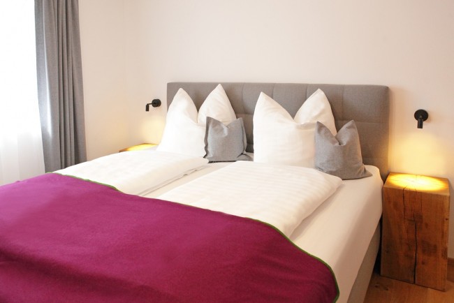 Schlafzimmer im Appartement Village Room